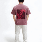 Back view of pink drop shoulder t-shirt on model